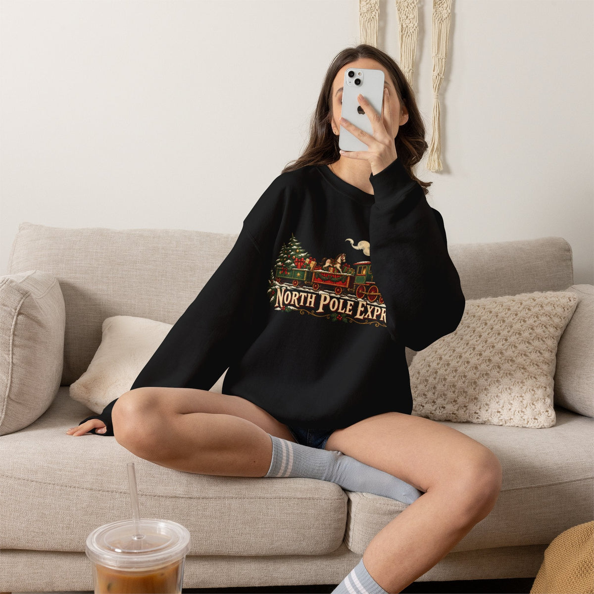 Wicked Thread Society black crewneck sweatshirt with a vintage North Pole Express Christmas train graphic print
