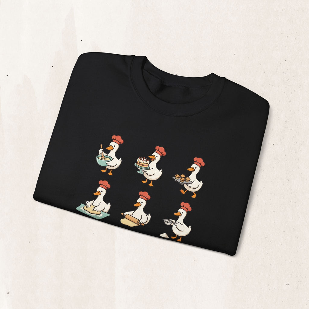Wicked Thread Society black crewneck sweatshirt featuring a whimsical print of geese dressed as chefs baking.