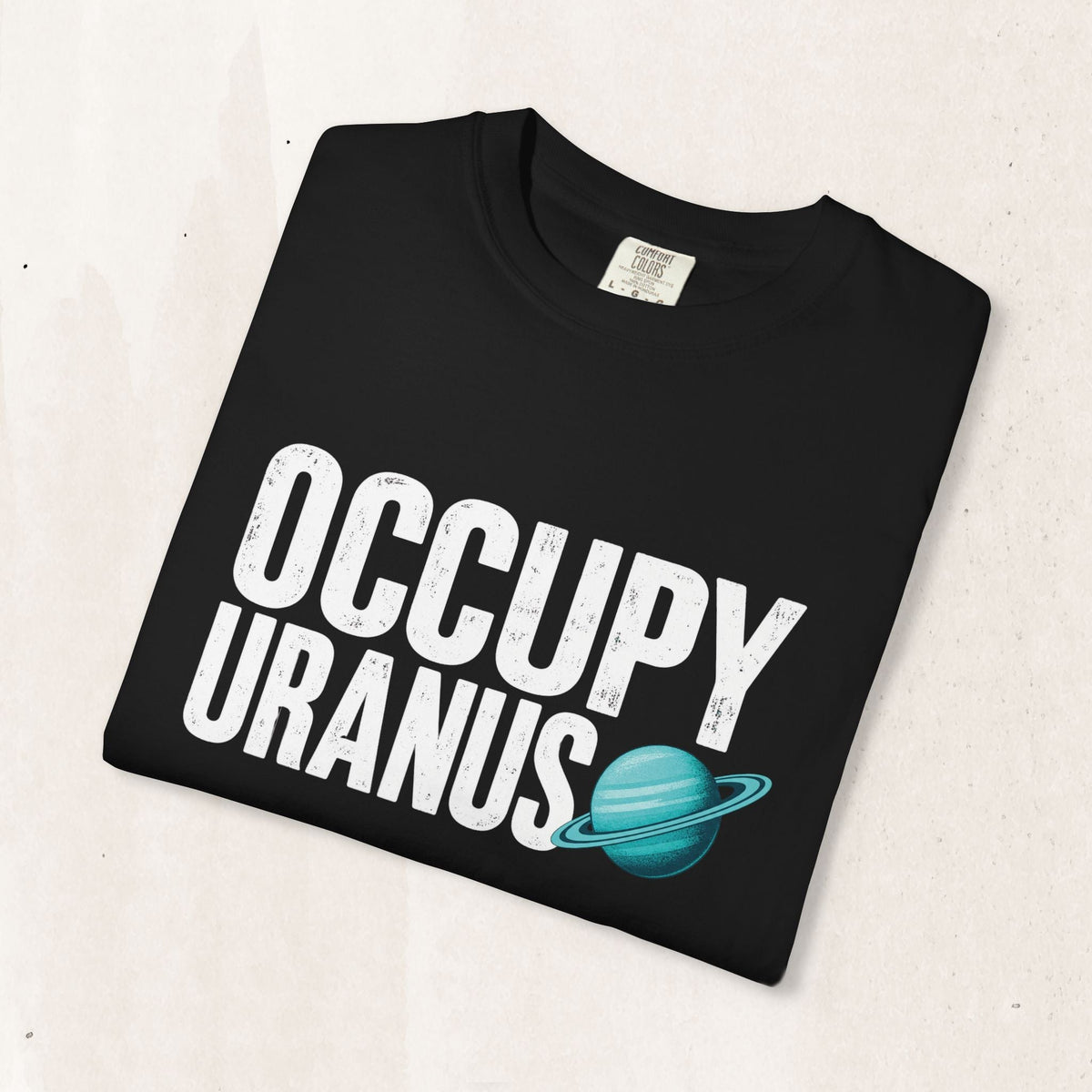 Wicked Thread Society black heavyweight cotton graphic tee with distressed white Occupy Uranus text and teal planet.