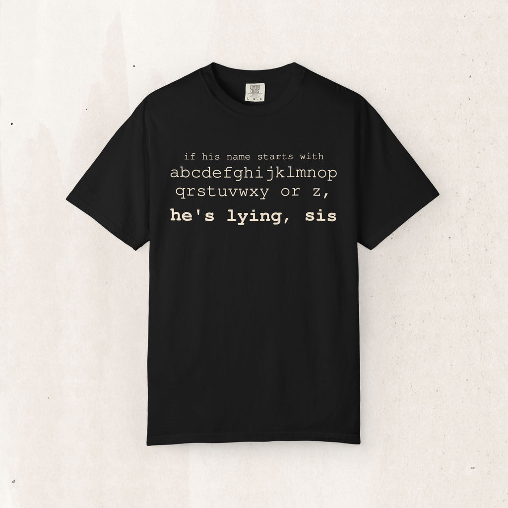 He's Lying, Sis T-shirt | Typographic alphabet humor tee Printify
