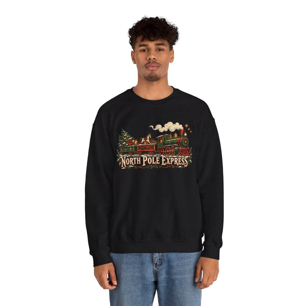 A man wearing a black Wicked Thread Society crewneck sweatshirt with a vintage North Pole Express train graphic.