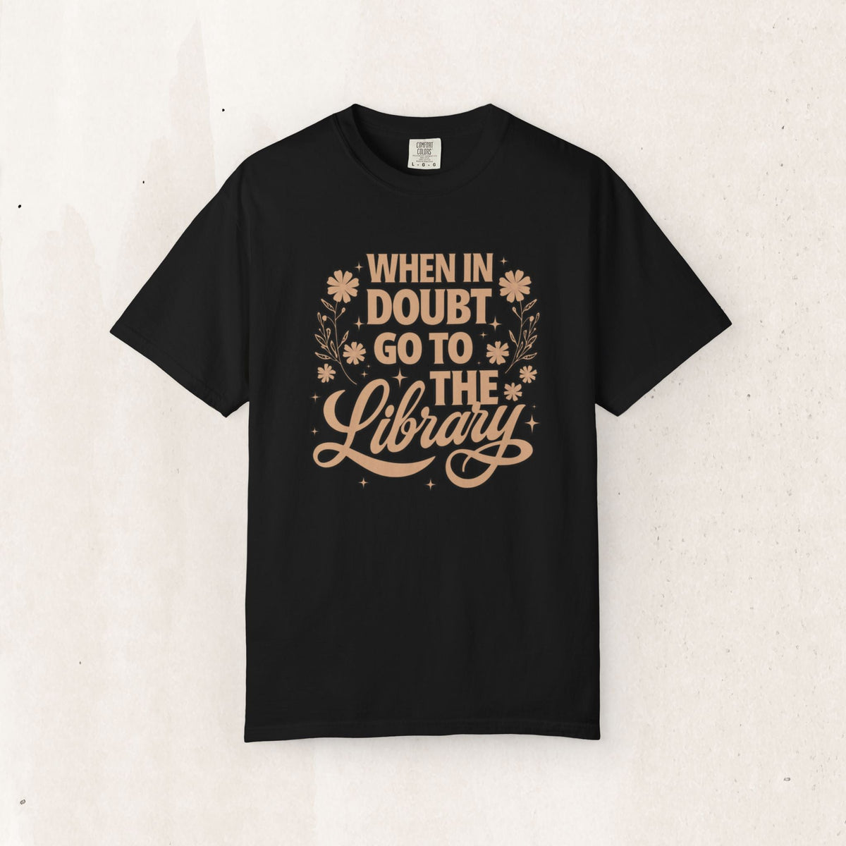 Wicked Thread Society black cotton graphic tee featuring When in Doubt Go to the Library text with floral accents.