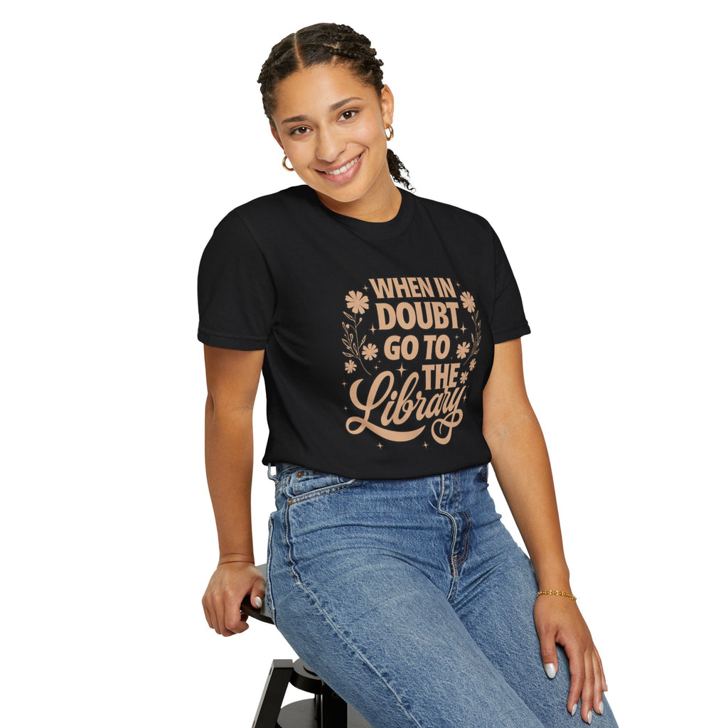 Wicked Thread Society black cotton graphic tee with When in Doubt Go to the Library text worn by a smiling woman