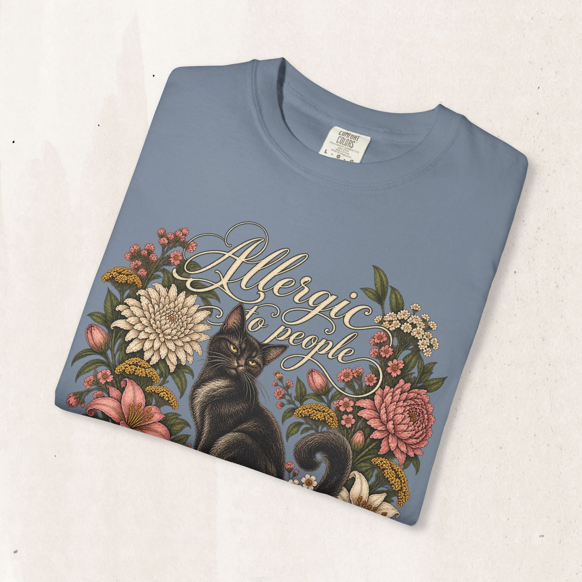 Wicked Thread Society blue graphic tee featuring a black cat illustration surrounded by a vintage floral wreath.