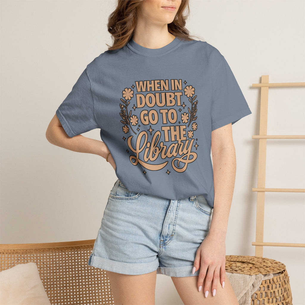 Wicked Thread Society blue garment-dyed cotton graphic tee with When in Doubt Go to the Library floral lettering.
