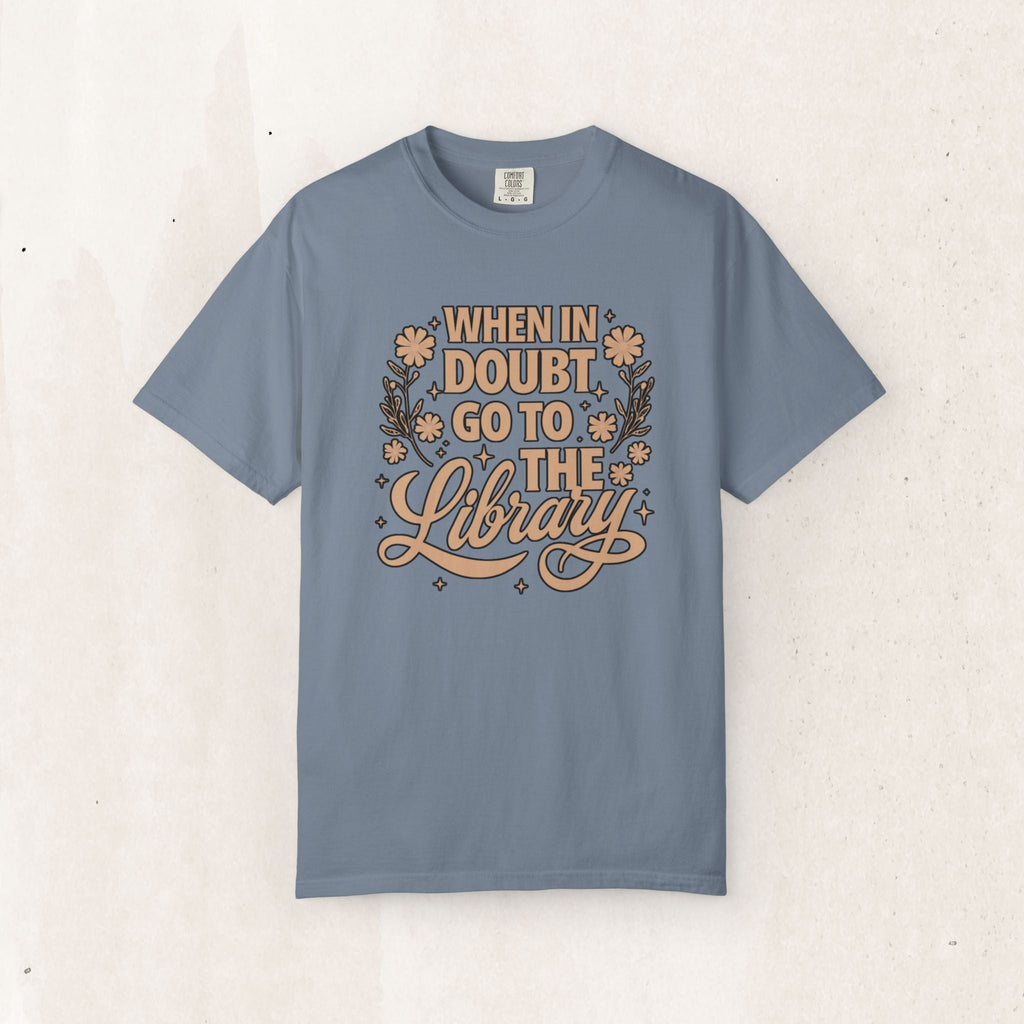 Wicked Thread Society blue garment-dyed cotton graphic tee with When in Doubt Go to the Library floral print