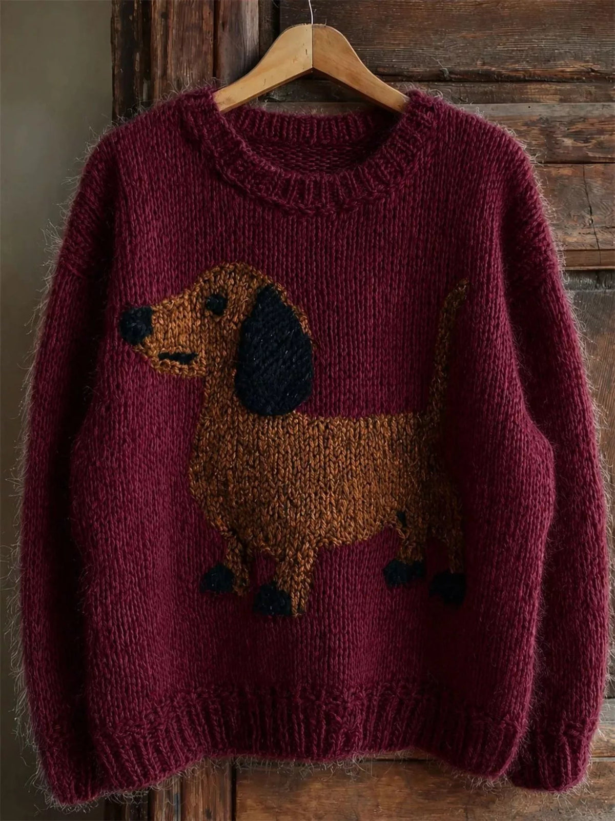 Wicked Thread Society maroon sweater featuring a knitted brown dachshund dog design with dropped shoulders.