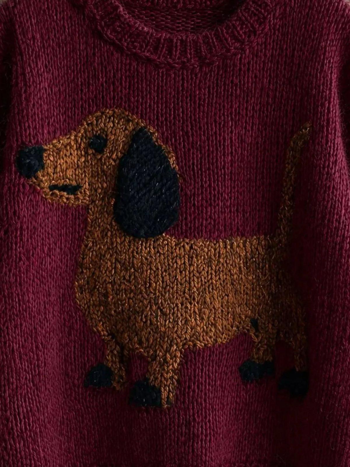Wicked Thread Society burgundy sweater featuring a knitted brown dachshund dog design with black accents.