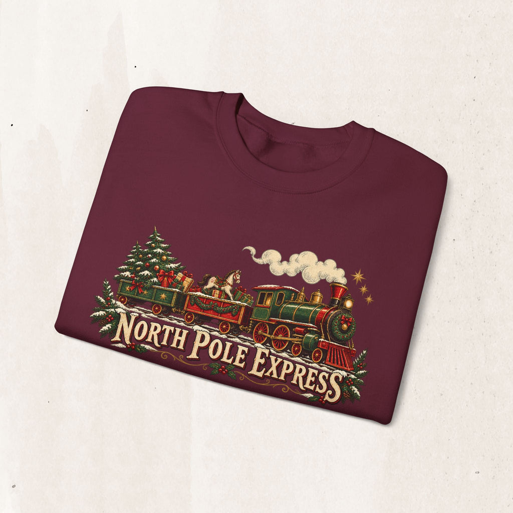 Wicked Thread Society burgundy crewneck sweatshirt with a vintage North Pole Express steam train Christmas graphic.