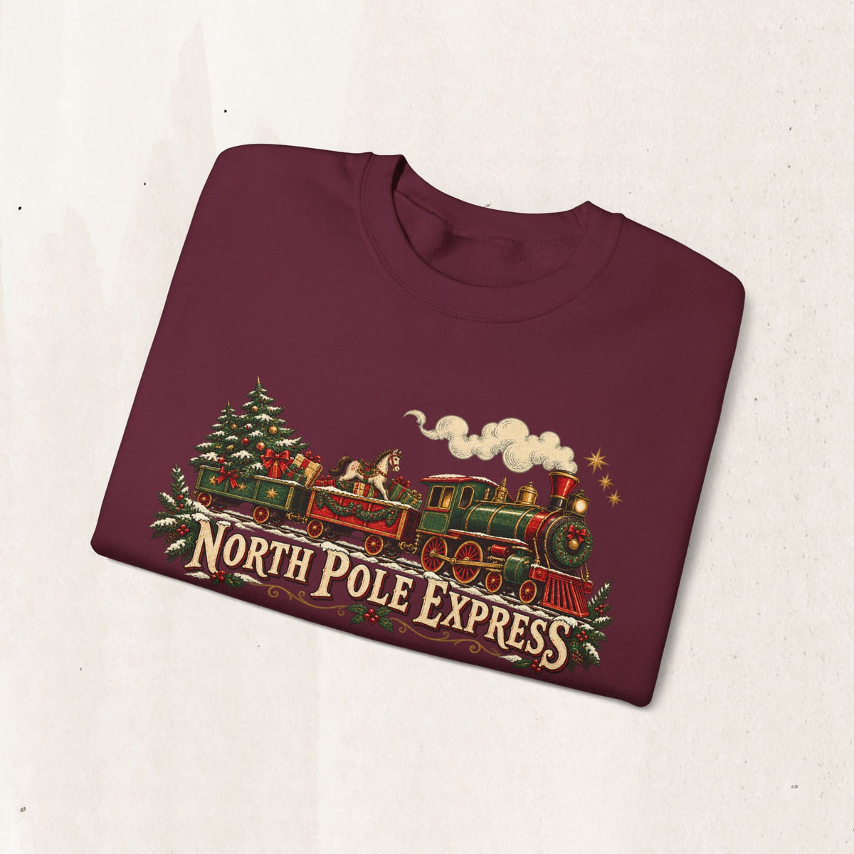 Wicked Thread Society burgundy crewneck sweatshirt with a vintage North Pole Express steam train Christmas graphic.