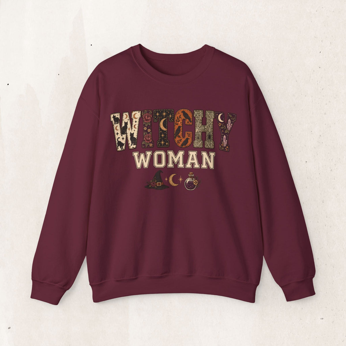 Wicked Thread Society maroon crewneck sweatshirt featuring a vintage-style Witchy Woman graphic with mystical motifs.