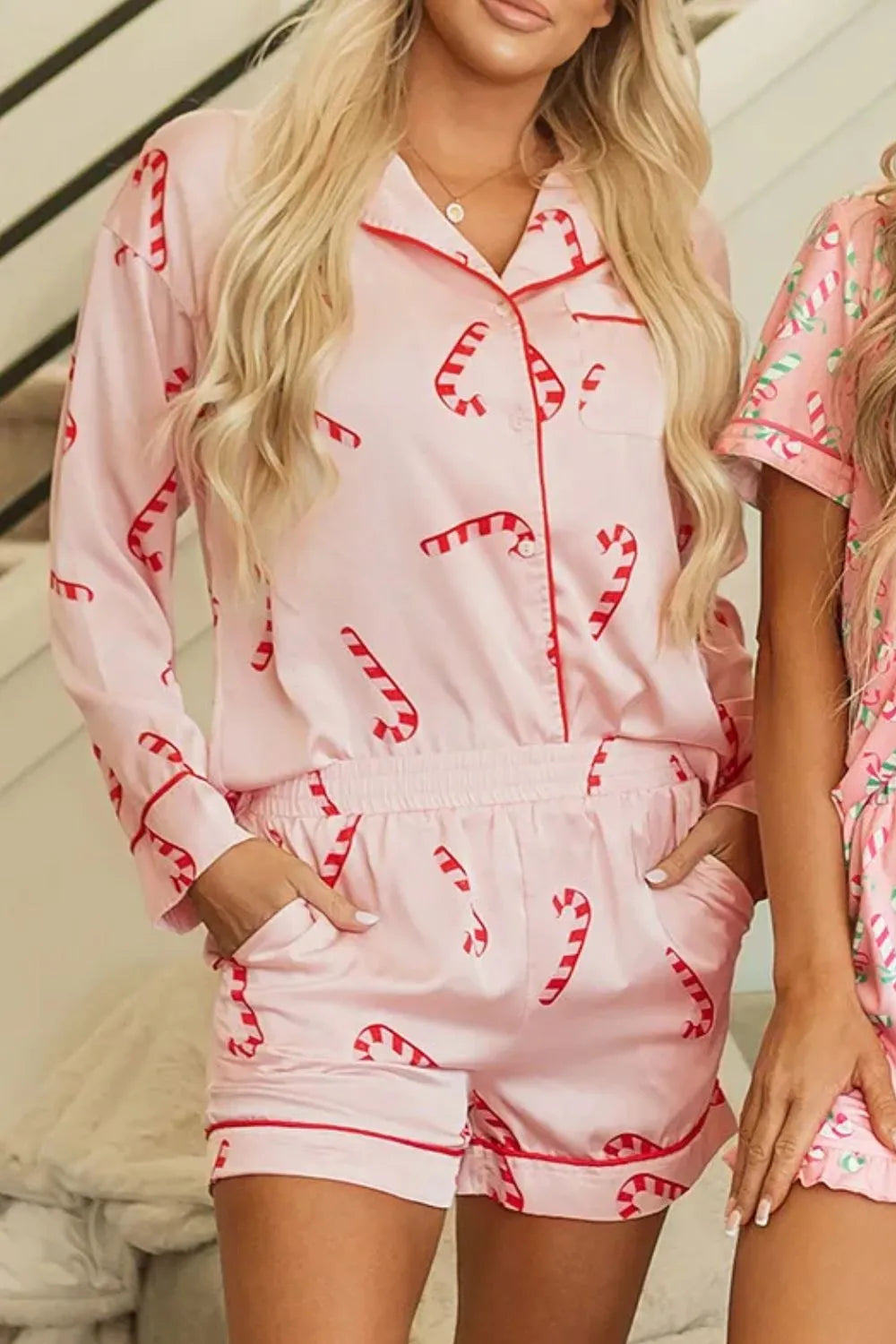 Wicked Thread Society pink lounge set with candy cane print, featuring a button-down collared top and matching shorts.