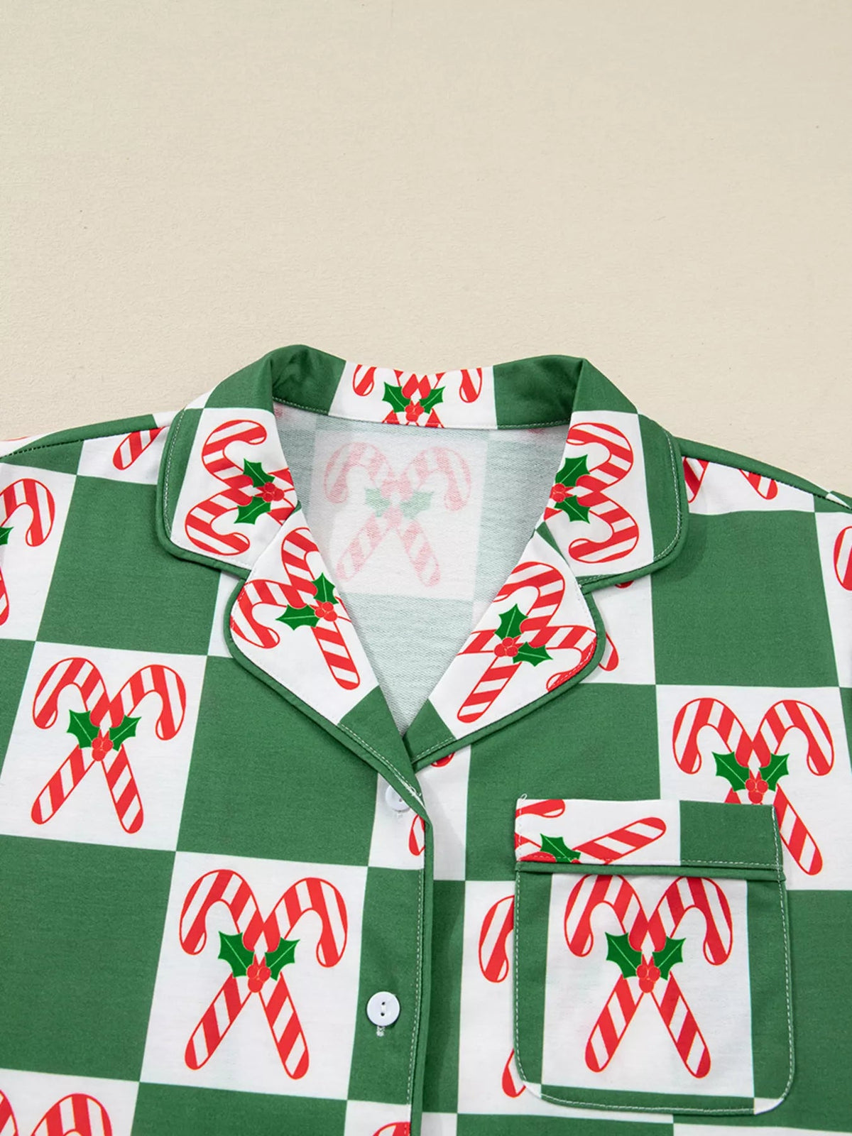 Wicked Thread Society candy cane checkered pajama top with button-down front, collar, and chest pocket.