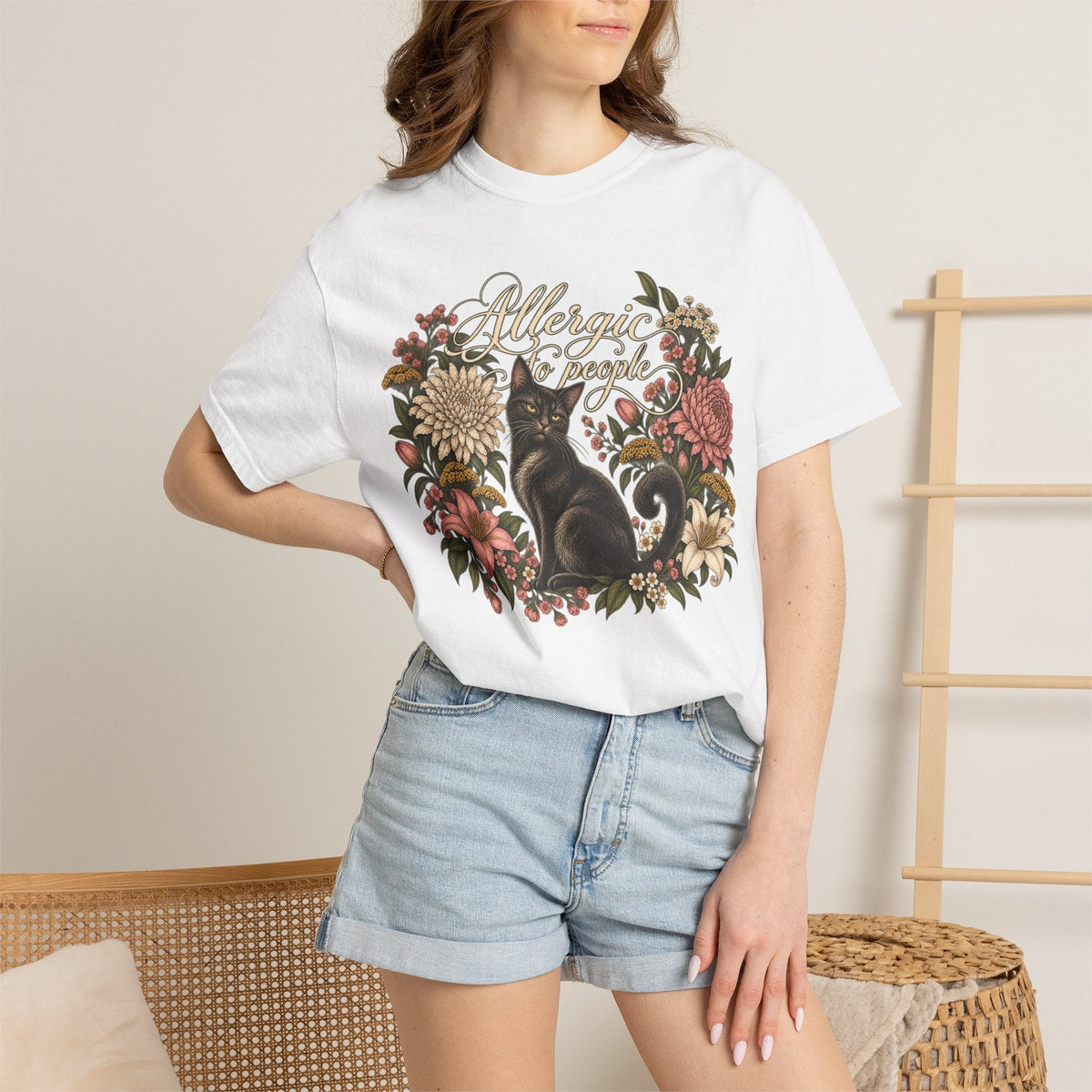 Wicked Thread Society white graphic tee featuring a black cat illustration and floral wreath with Allergic to People text