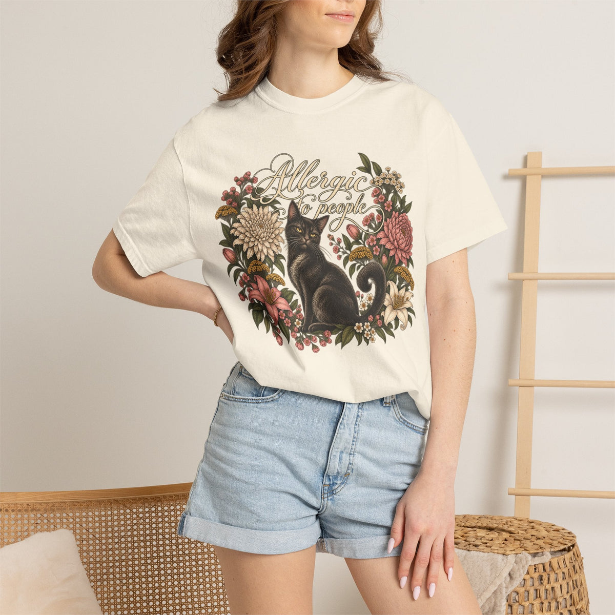 Wicked Thread Society cream graphic t-shirt featuring a black cat illustration inside a vintage floral wreath