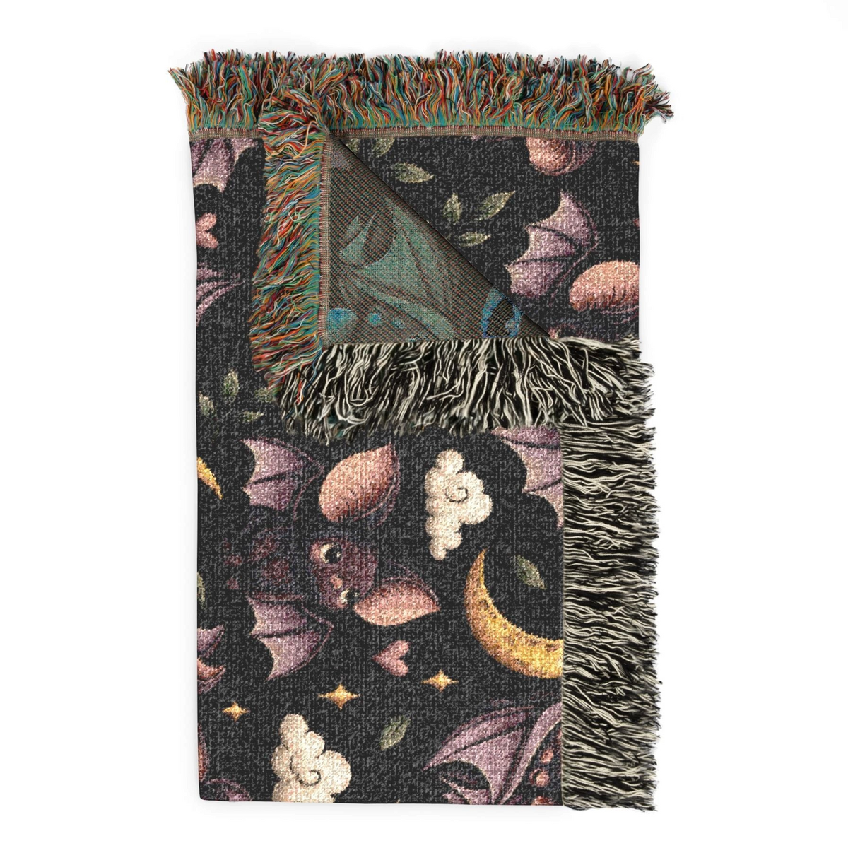 Wicked Thread Society celestial cotton throw blanket with moon, cloud, and bat motifs and colorful fringed edges.