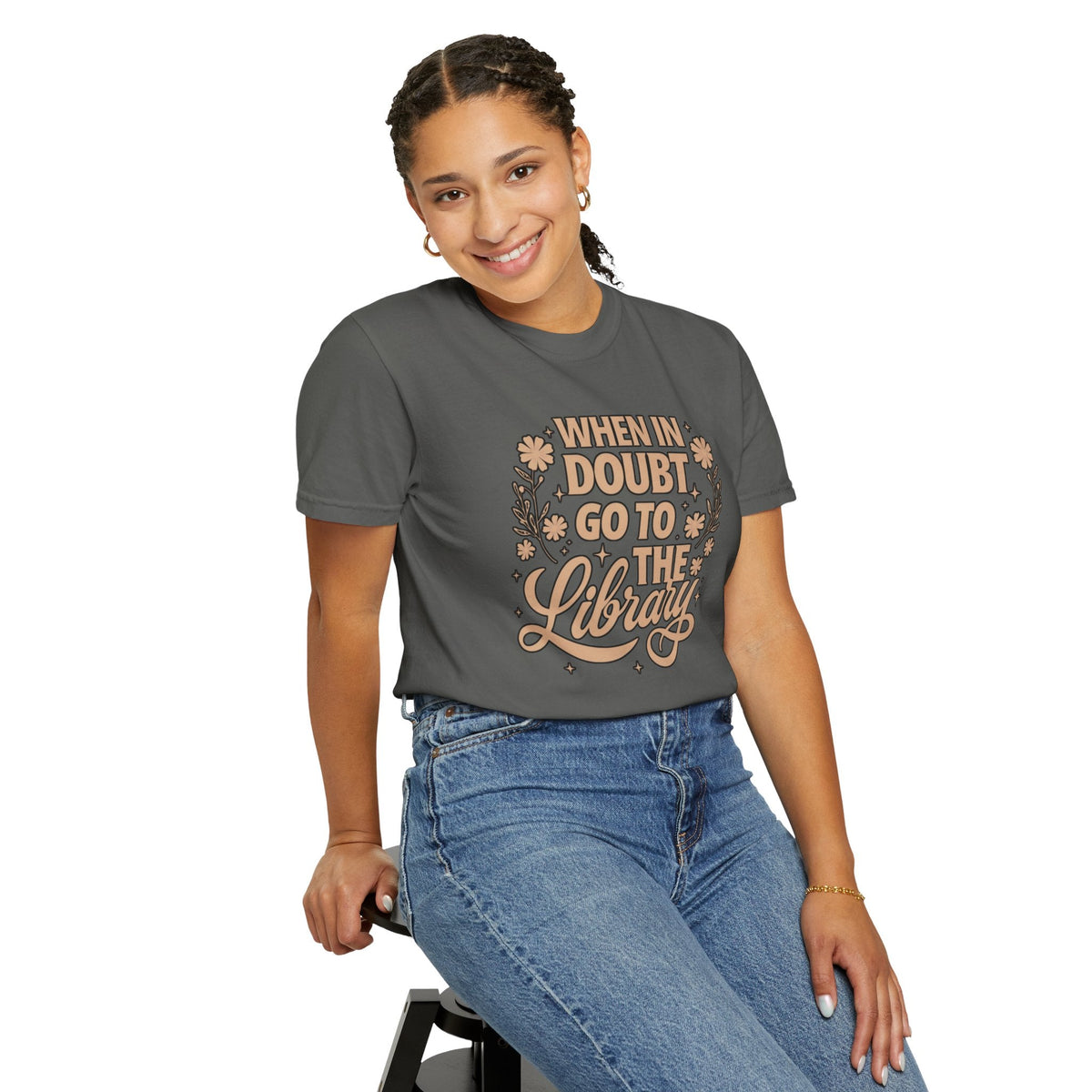 Wicked Thread Society charcoal grey graphic tee with When in Doubt Go to the Library text worn by a smiling woman.