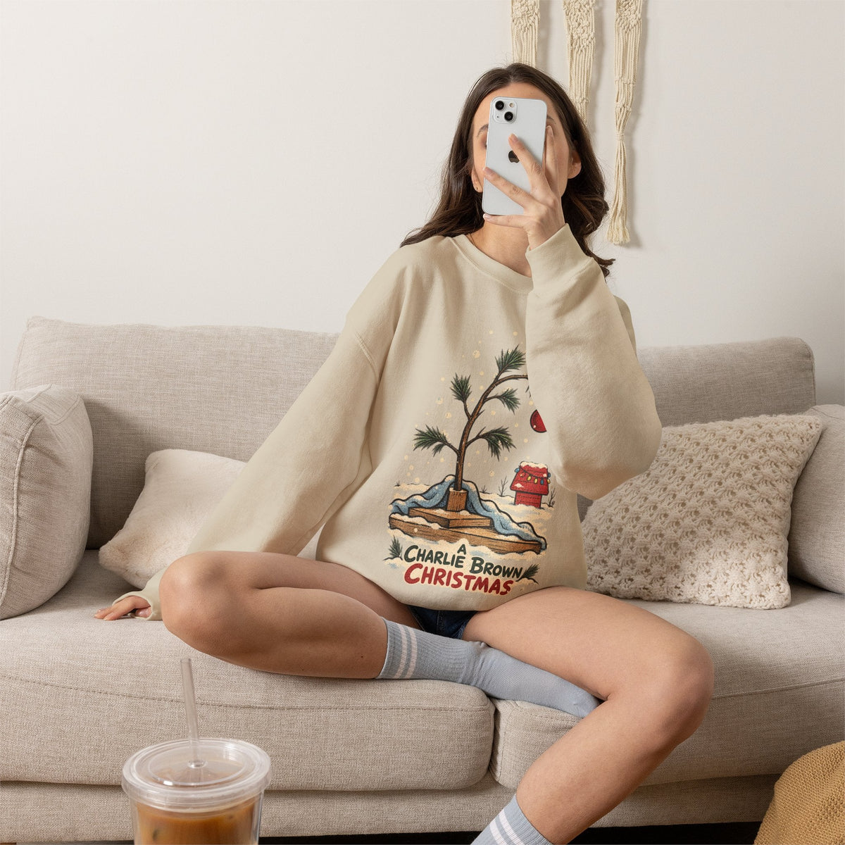 Wicked Thread Society beige crewneck sweatshirt featuring a hand-illustrated Charlie Brown Christmas tree graphic.
