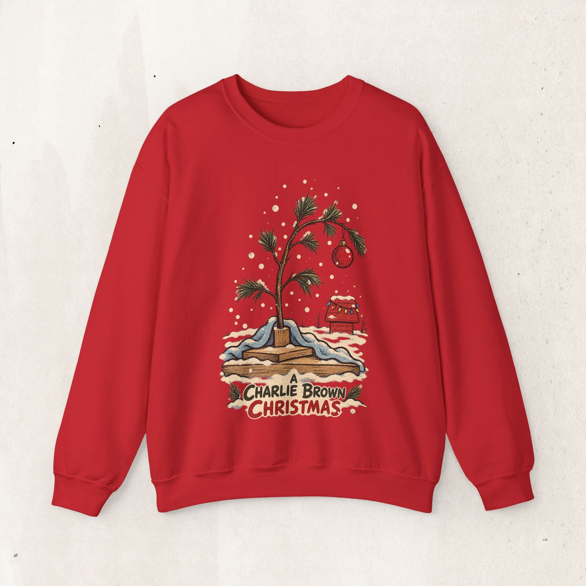 Wicked Thread Society red crewneck sweatshirt featuring a nostalgic Charlie Brown Christmas tree illustration.