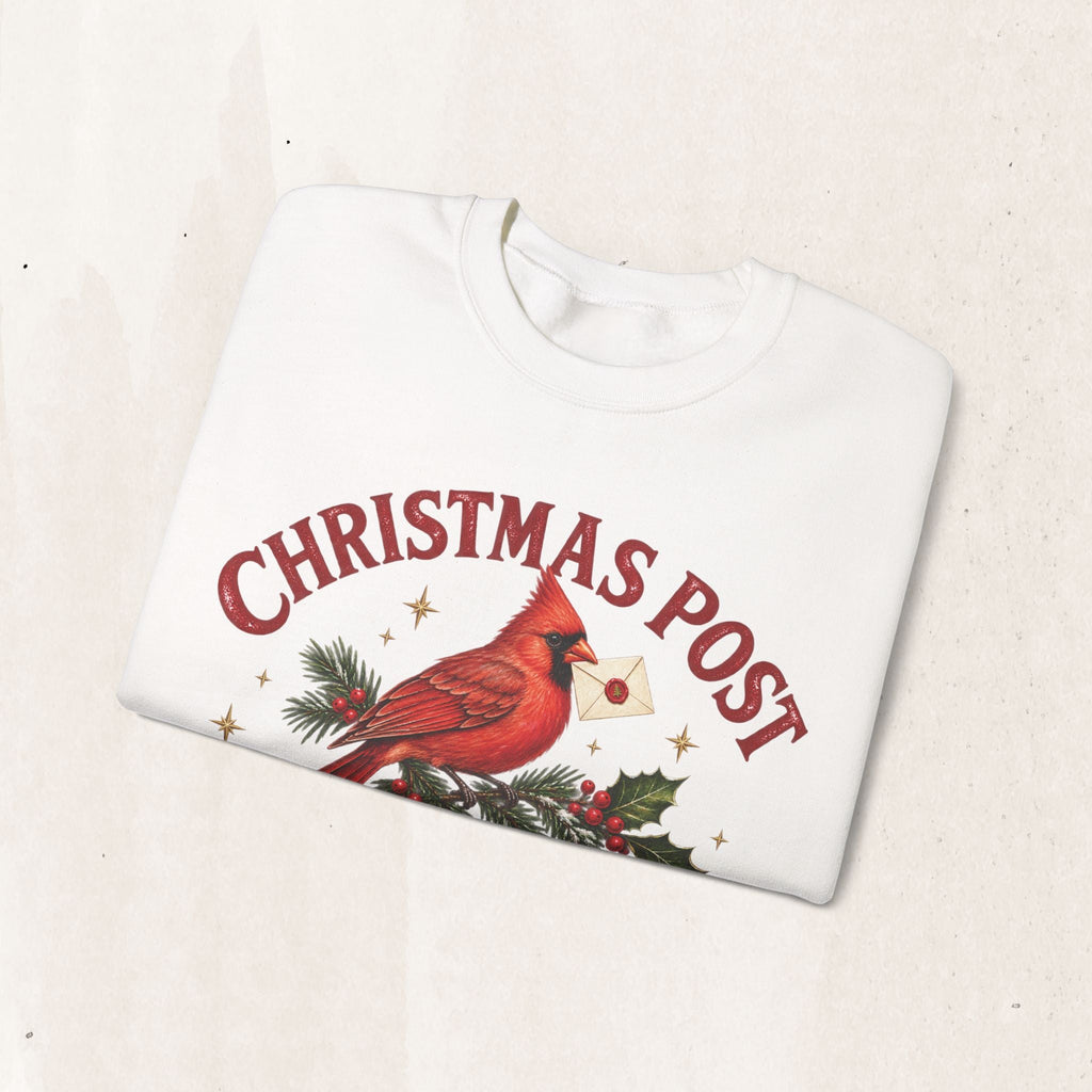Wicked Thread Society white crewneck sweatshirt featuring a cardinal bird illustration and Christmas Post text.