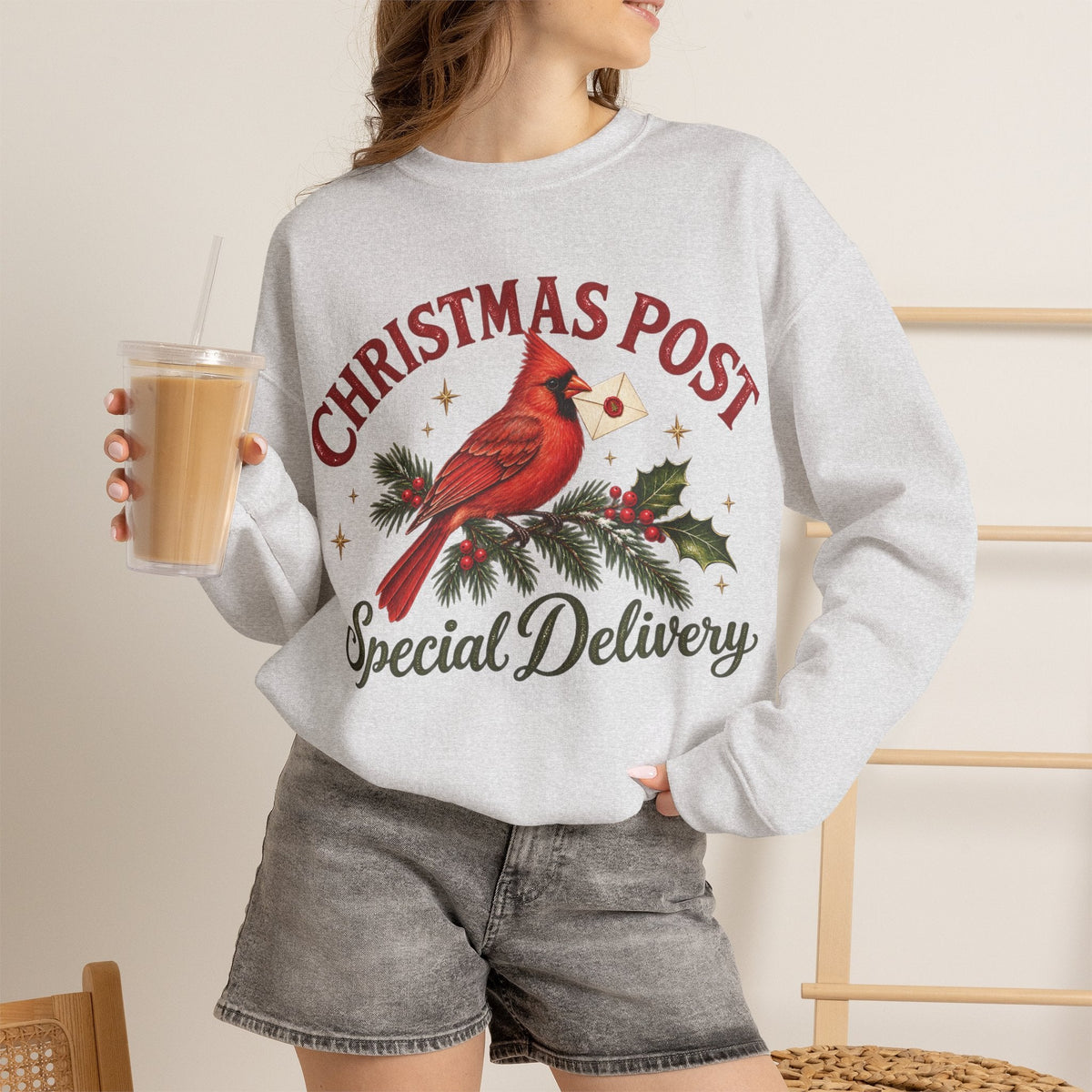 Wicked Thread Society grey crewneck sweatshirt featuring a cardinal bird with a letter and Christmas Post text.