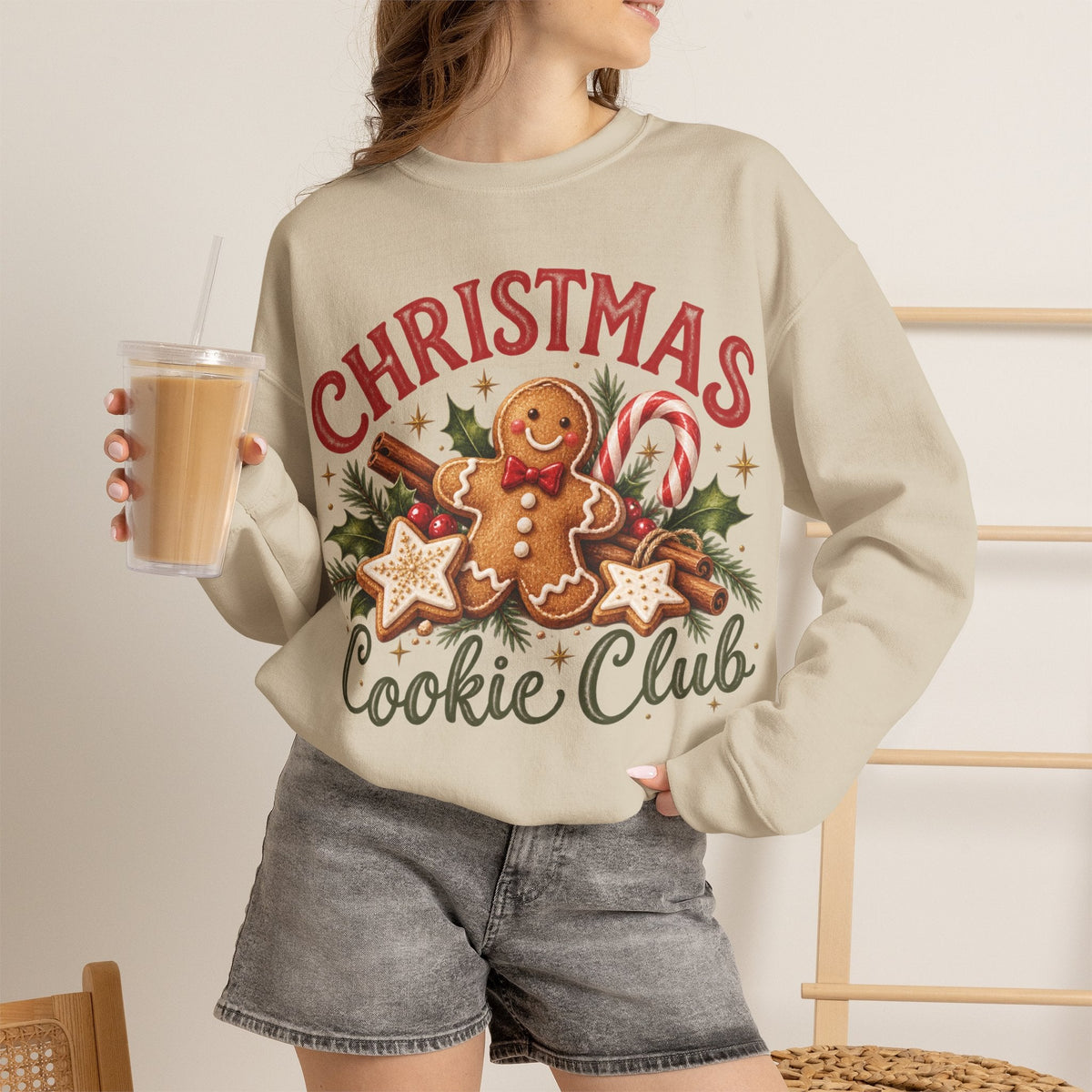 Wicked Thread Society beige crewneck sweatshirt with a festive gingerbread man, candy cane, and cookie graphic.