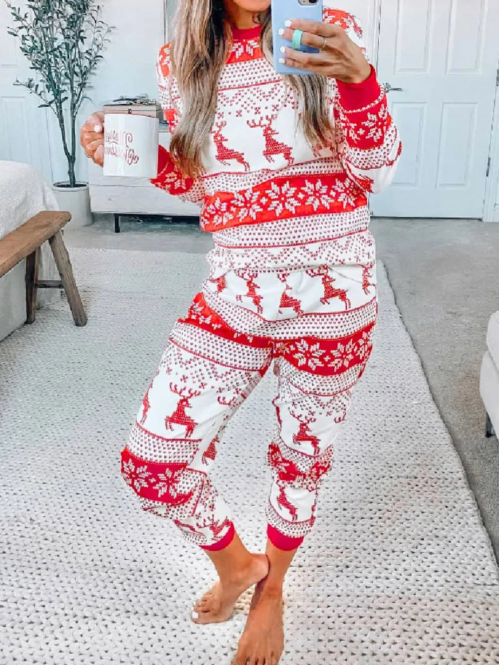 Wicked Thread Society two-piece Christmas pajama set with red and white reindeer and snowflake print