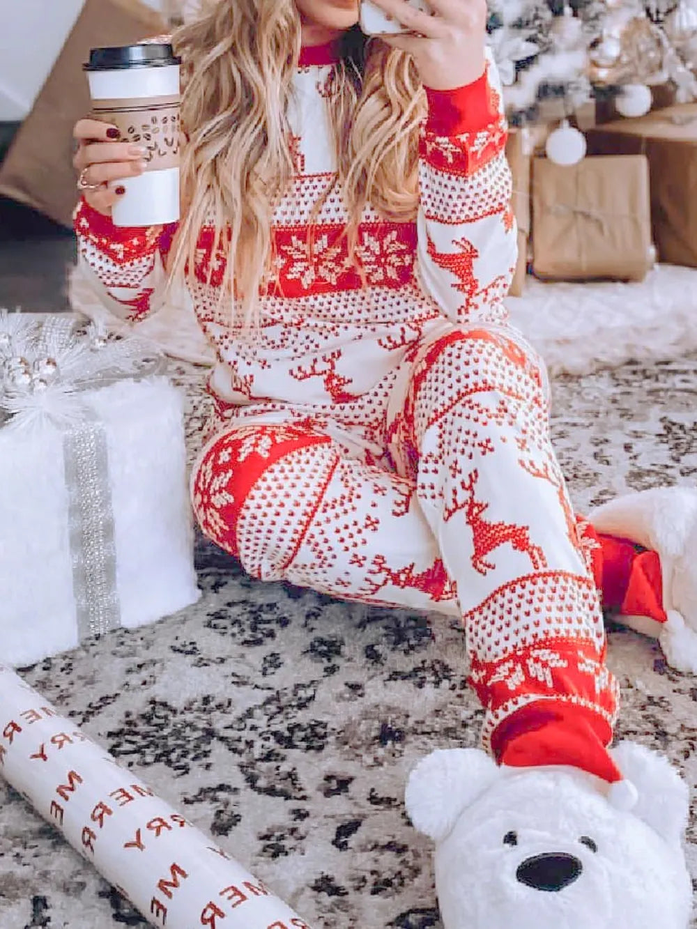 Wicked Thread Society two-piece Christmas pajama set with red and white reindeer pattern and fuzzy bear slippers