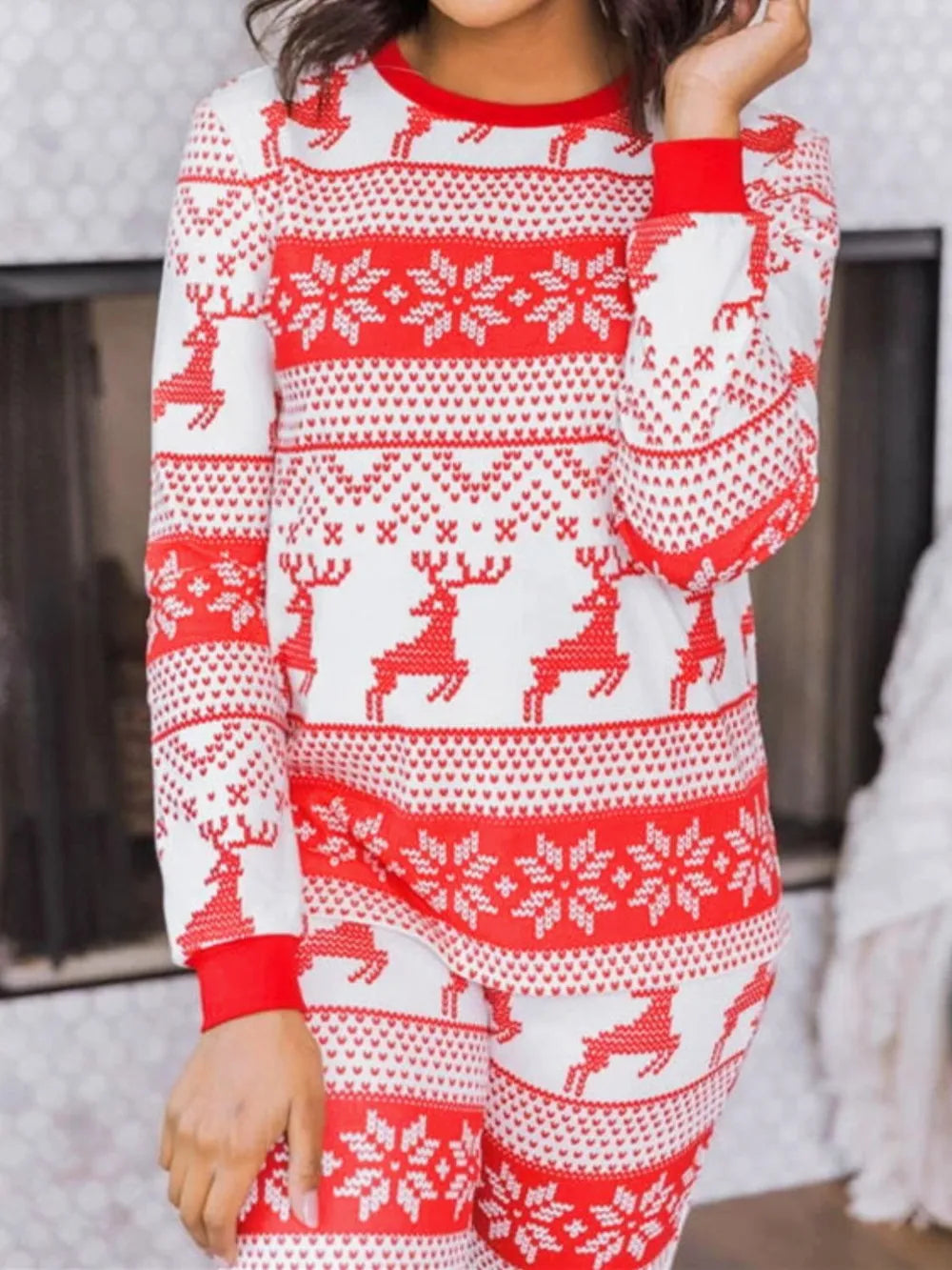 Wicked Thread Society two-piece Christmas pajama set with red and white reindeer and snowflake fair isle pattern