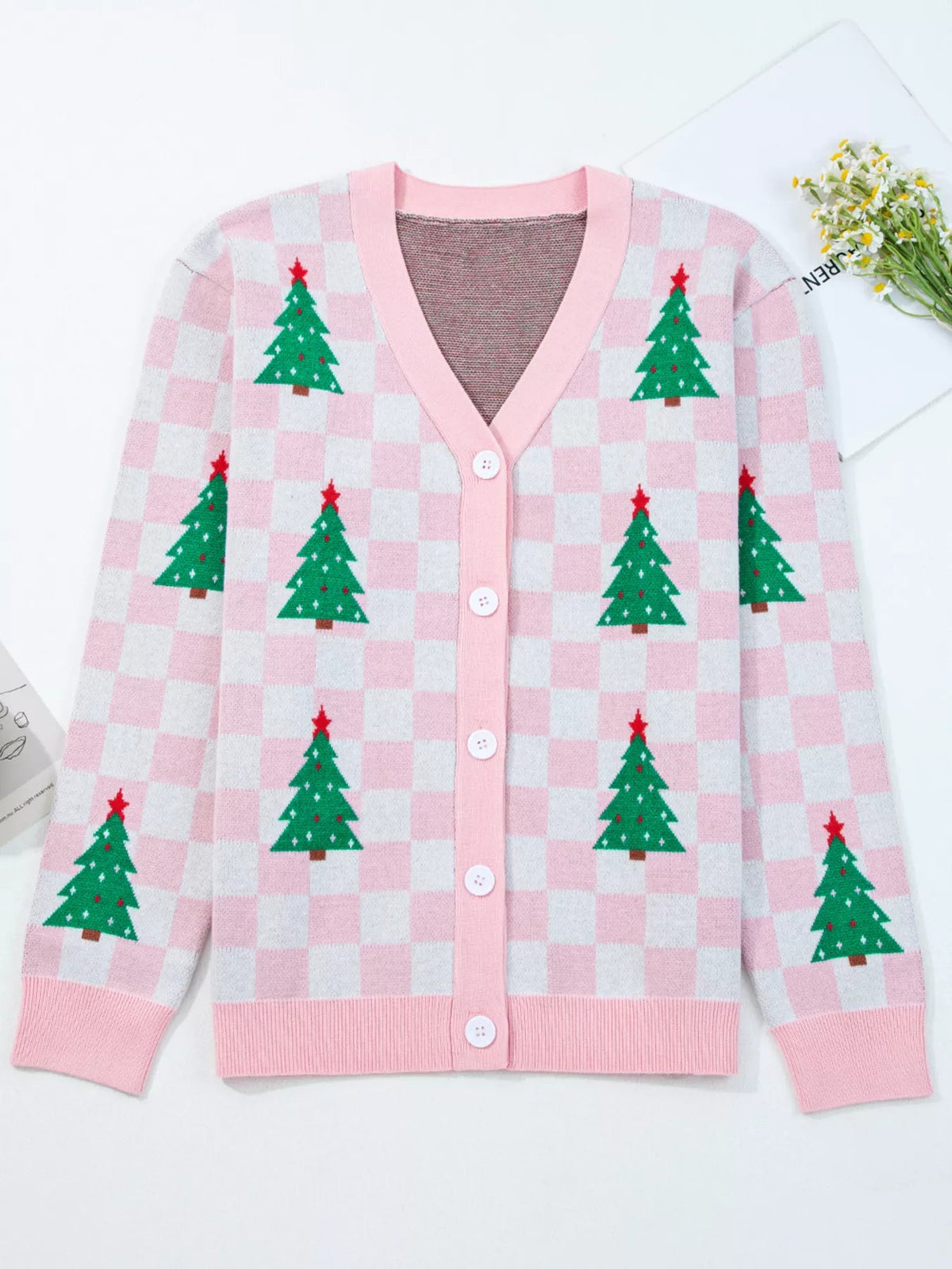 Wicked Thread Society pink and white checkered V-neck cardigan with green Christmas tree patterns and button front.