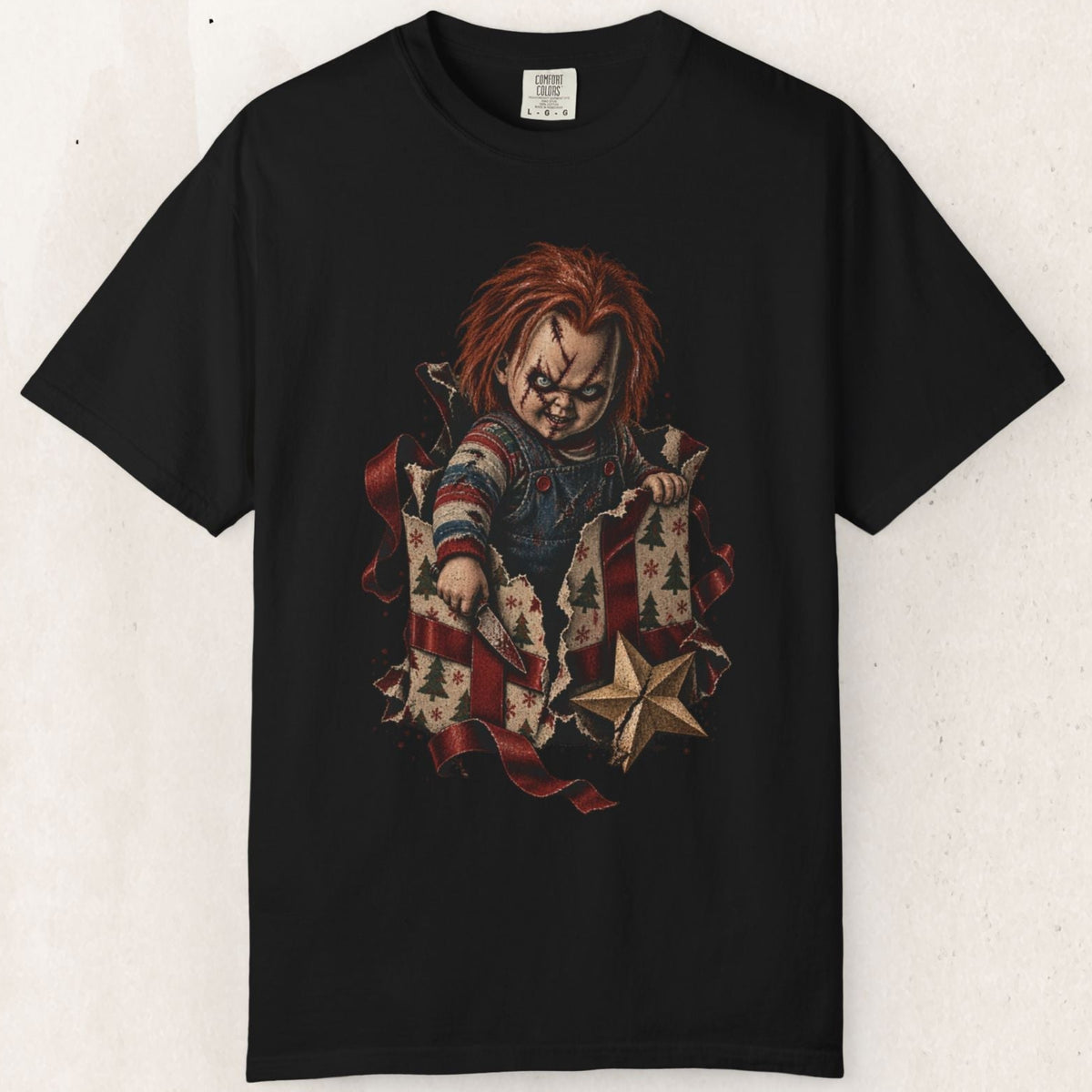 Wicked Thread Society black heavyweight cotton t-shirt featuring a Chucky Christmas gift box graphic print.