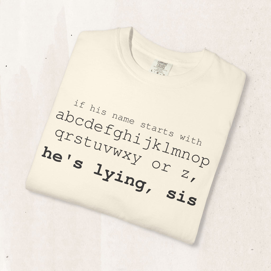 He's Lying, Sis T-shirt | Typographic alphabet humor tee Printify