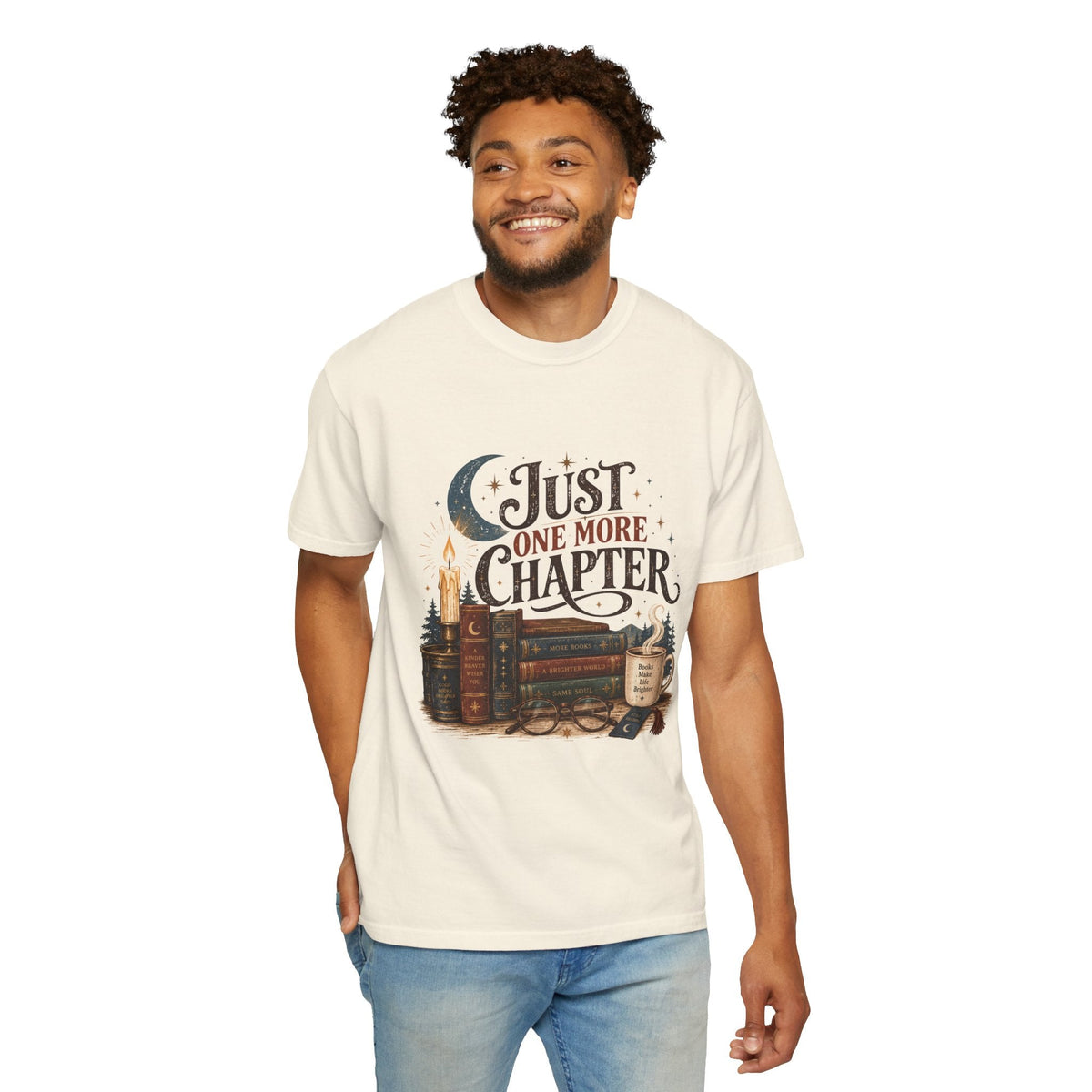 Wicked Thread Society cream graphic tee featuring a stack of vintage books, candle, and Just One More Chapter text.
