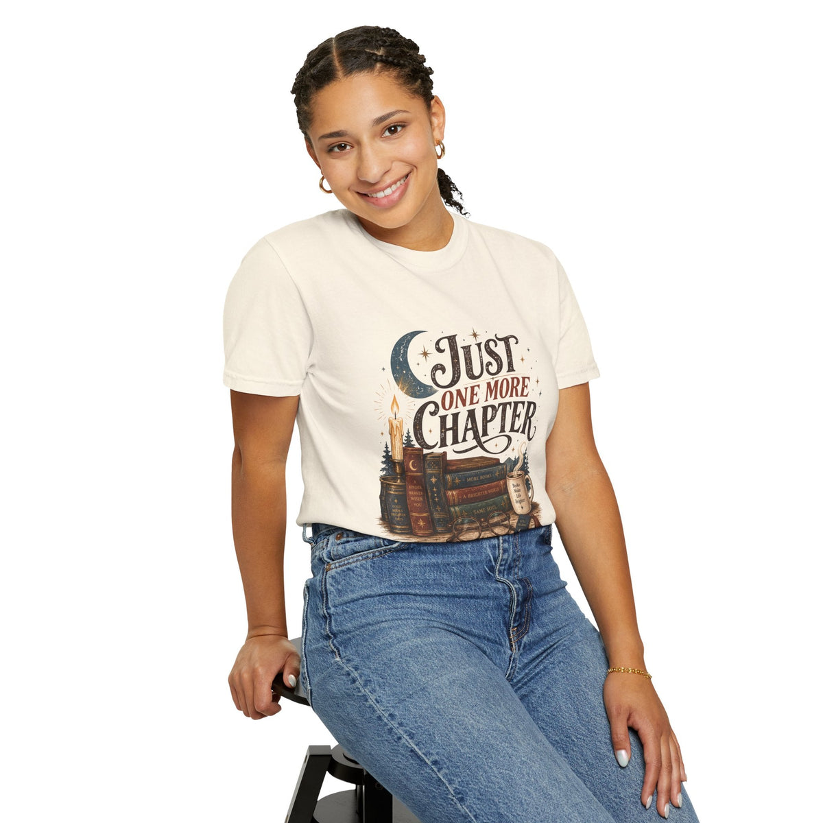 Wicked Thread Society cream graphic tee featuring a bookish illustration of stacked books, a candle, and moon.