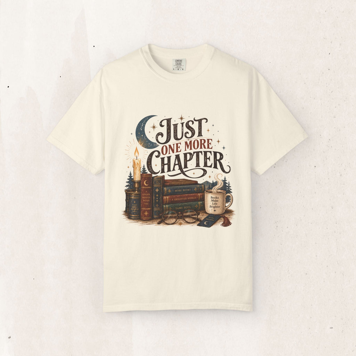 Wicked Thread Society cream graphic tee featuring a vintage book, candle, and moon illustration for book lovers.