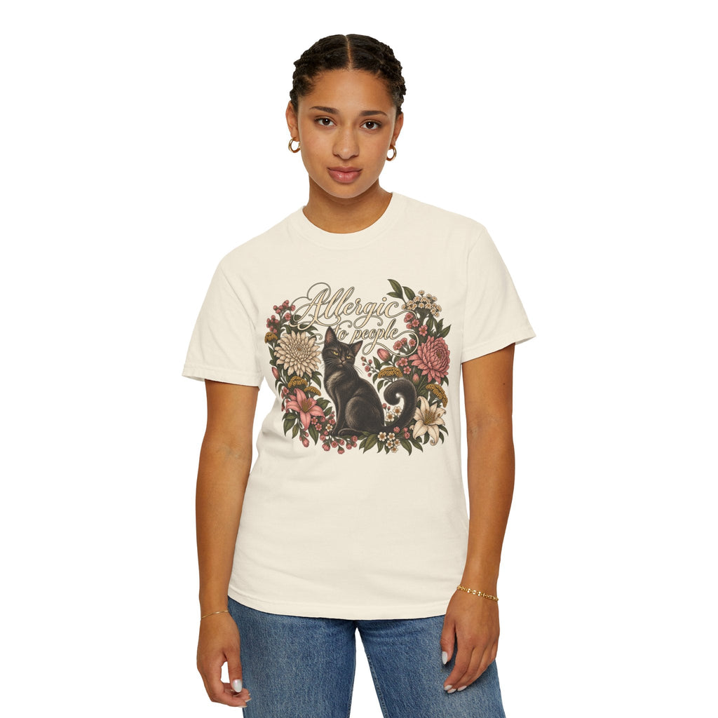 Wicked Thread Society cream graphic t-shirt featuring a black cat illustration and floral wreath on a woman