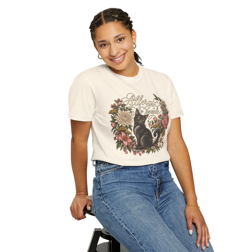 Wicked Thread Society cream graphic t-shirt featuring a black cat and floral wreath illustration on a smiling woman