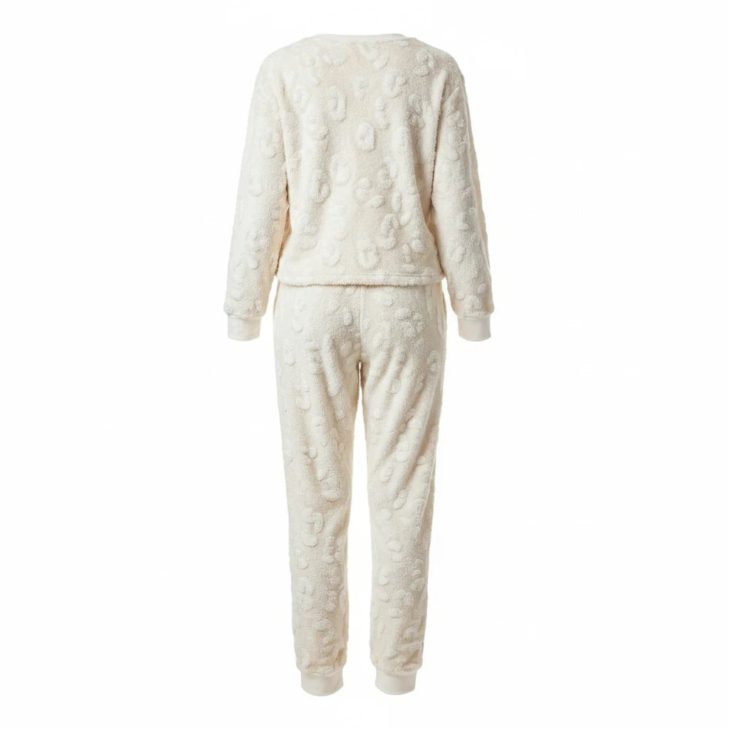 Back view of a Wicked Thread Society cream-colored two-piece lounge set with a textured leopard print pattern.