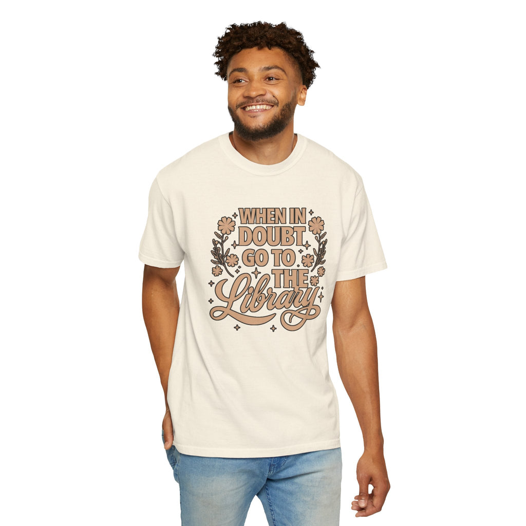 Wicked Thread Society cream graphic tee with When in Doubt Go to the Library text and floral art on a smiling man