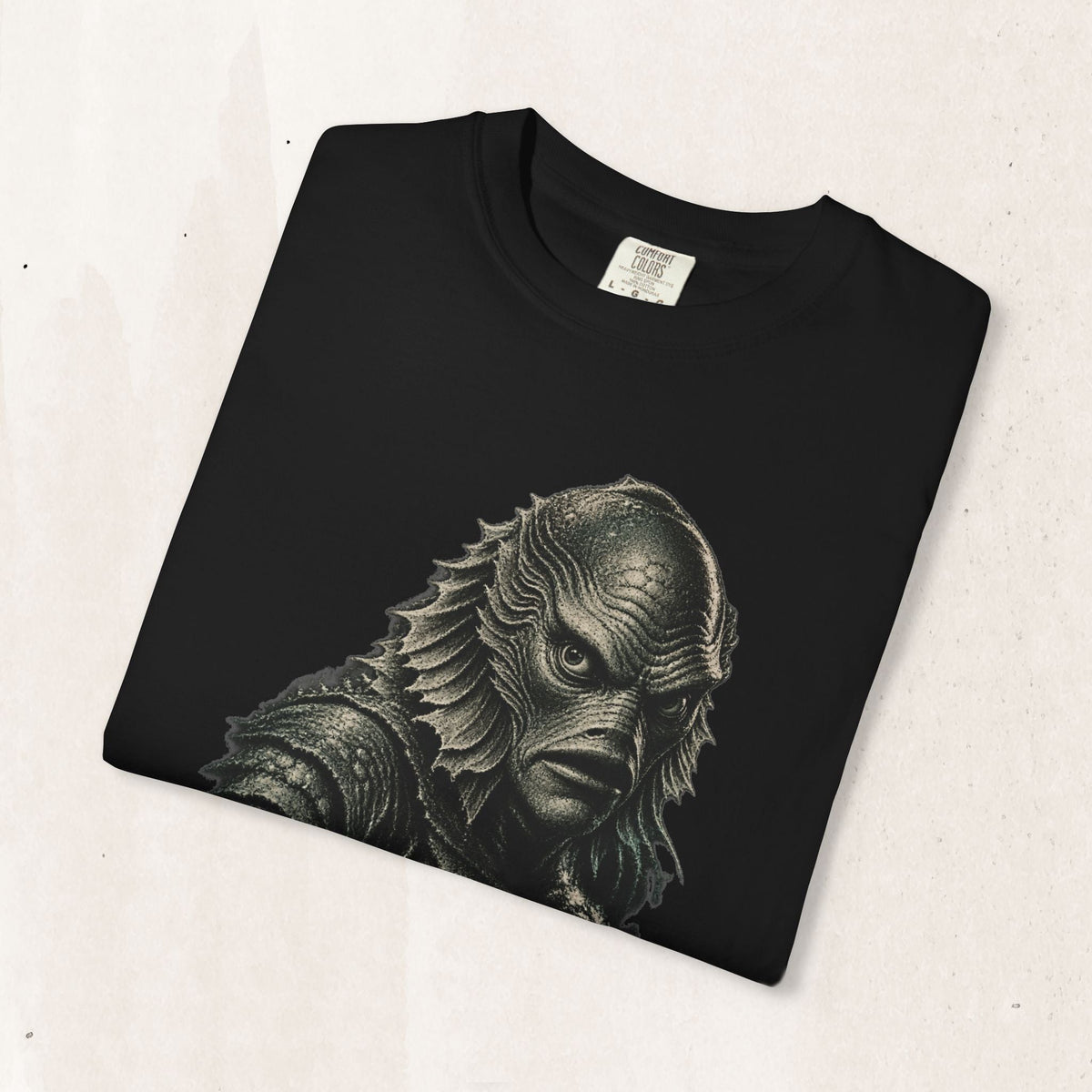 Wicked Thread Society black graphic tee featuring a detailed Creature of the Black Lagoon Gill-man illustration.