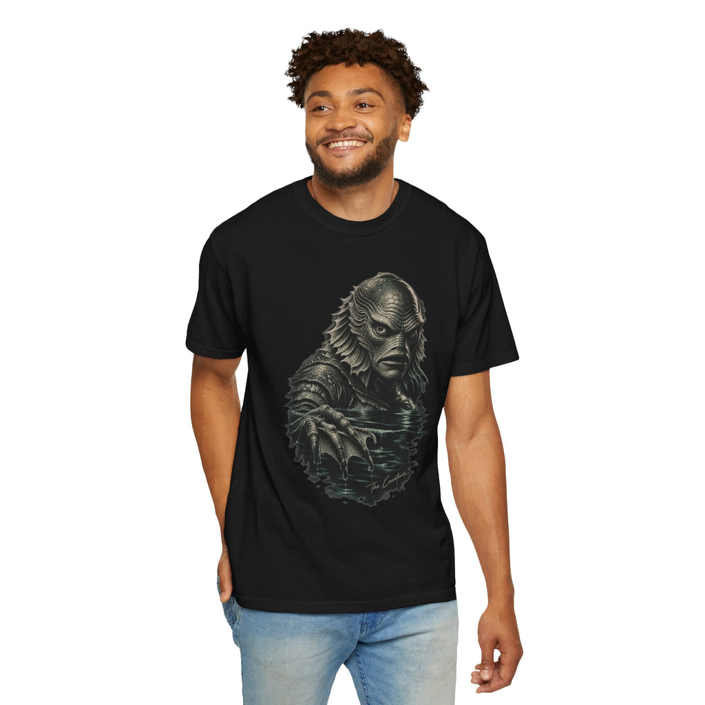 Wicked Thread Society black graphic t-shirt featuring a detailed Creature of the Black Lagoon illustration on a man