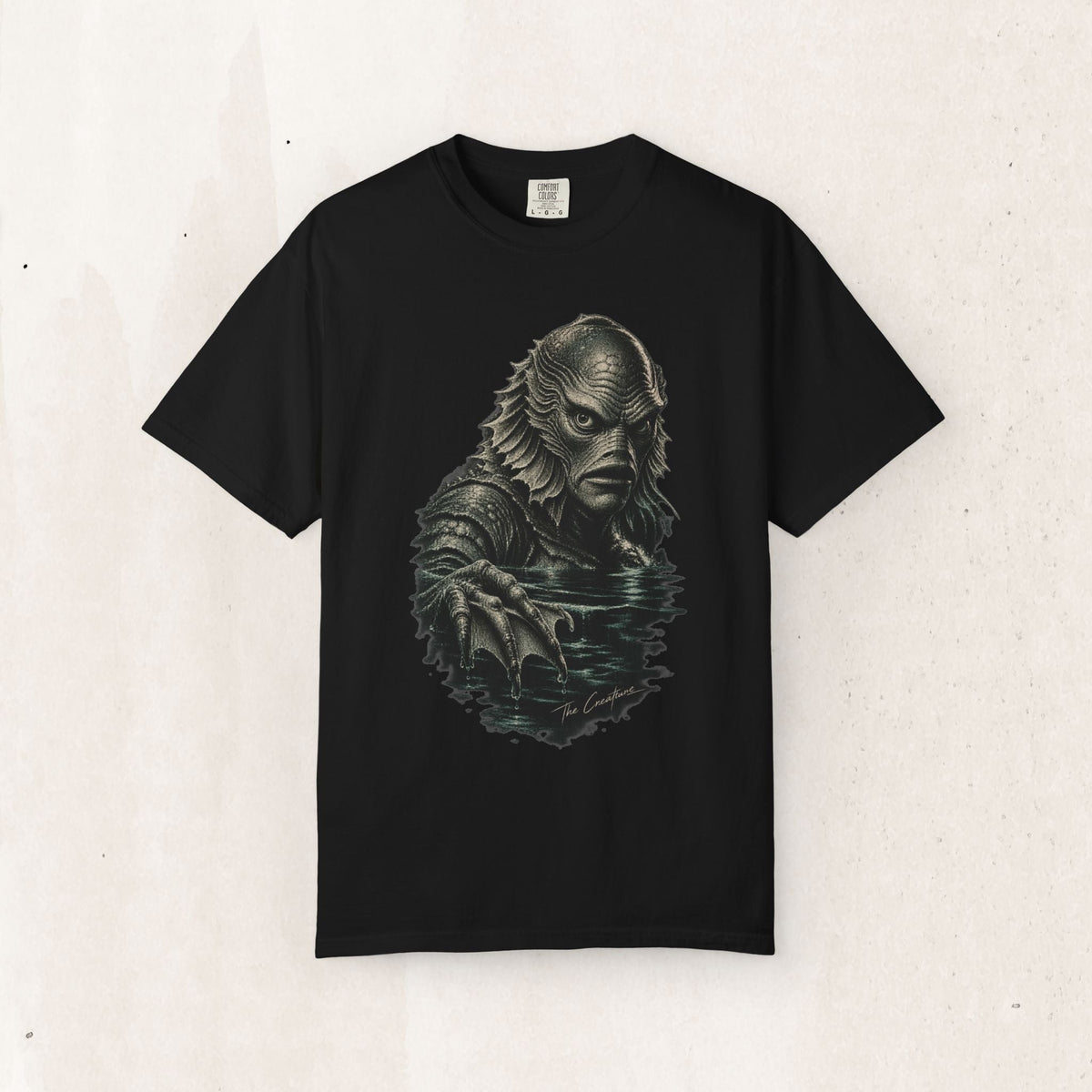Wicked Thread Society black graphic t-shirt featuring a detailed illustration of the Creature from the Black Lagoon.