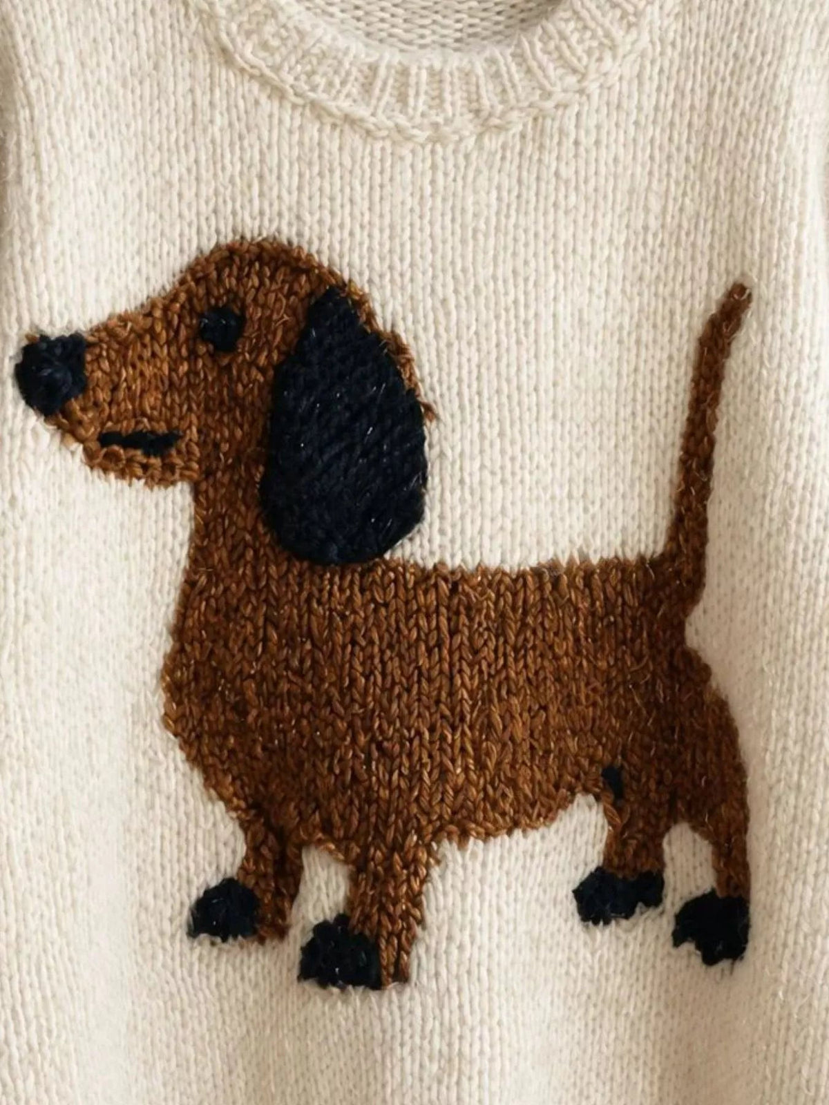 Wicked Thread Society cream sweater featuring a brown and black dachshund dog knit design with dropped shoulders.