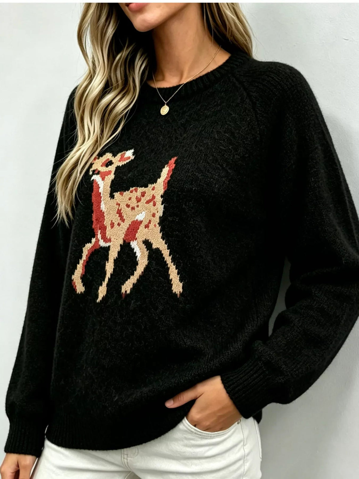 Wicked Thread Society black raglan sleeve sweater featuring a deer pattern, made from soft stretchy polyester