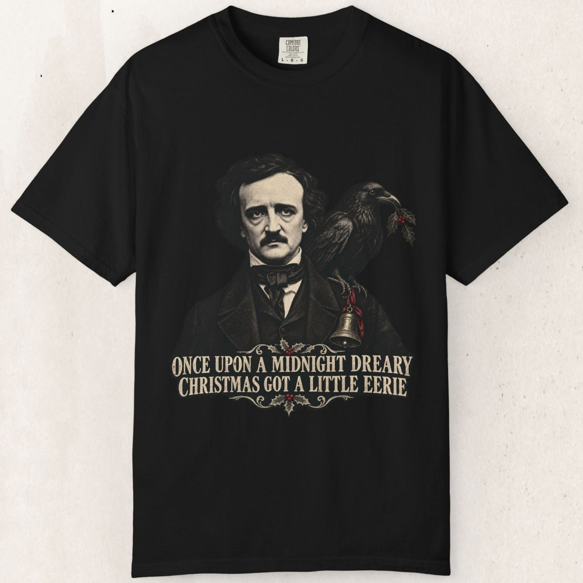 Wicked Thread Society black cotton t-shirt featuring an Edgar Allan Poe portrait and raven with Christmas holly.