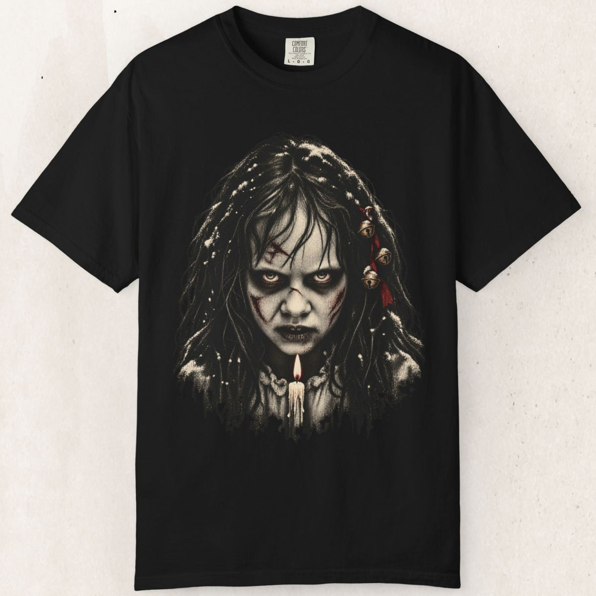 Wicked Thread Society black heavyweight cotton t-shirt featuring a detailed, haunting portrait of Reagan from The Exorcist.