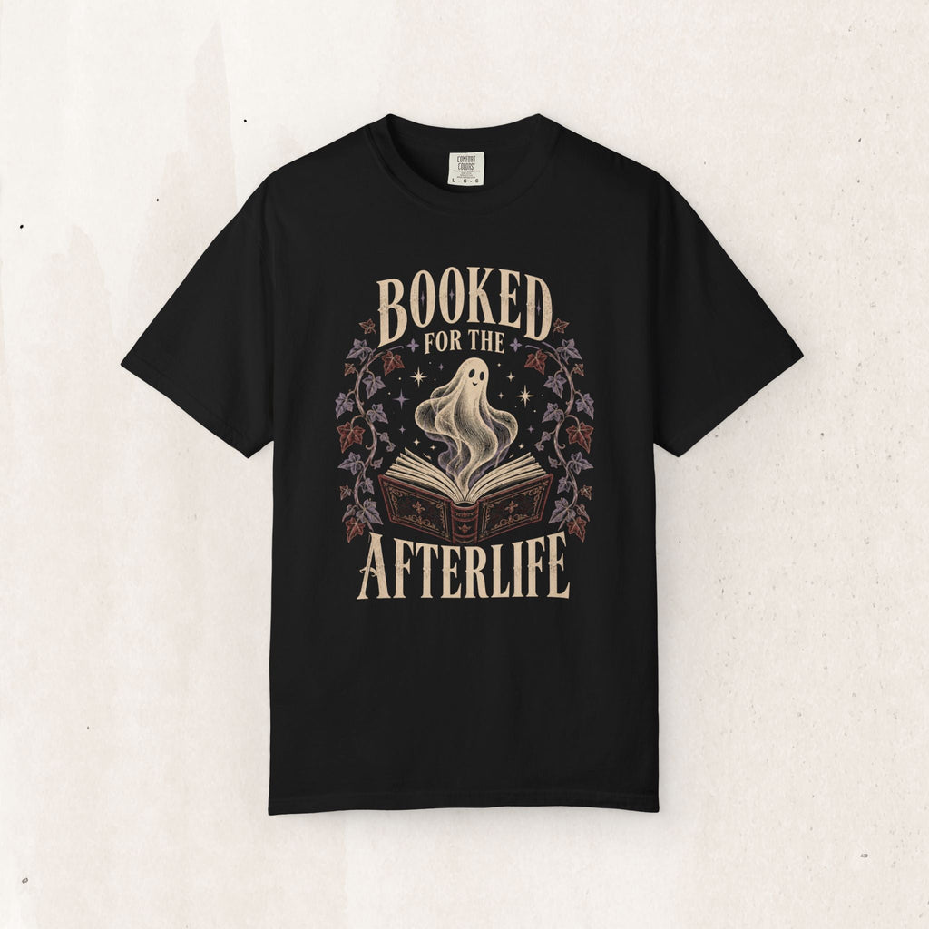 Wicked Thread Society faded black heavyweight cotton tee featuring a ghost rising from a book with botanical art.