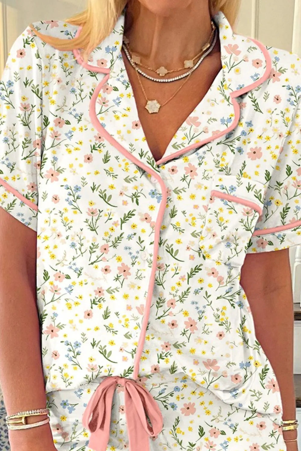 Wicked Thread Society floral print button-up lounge set with pink piping, short sleeves, and drawstring shorts.