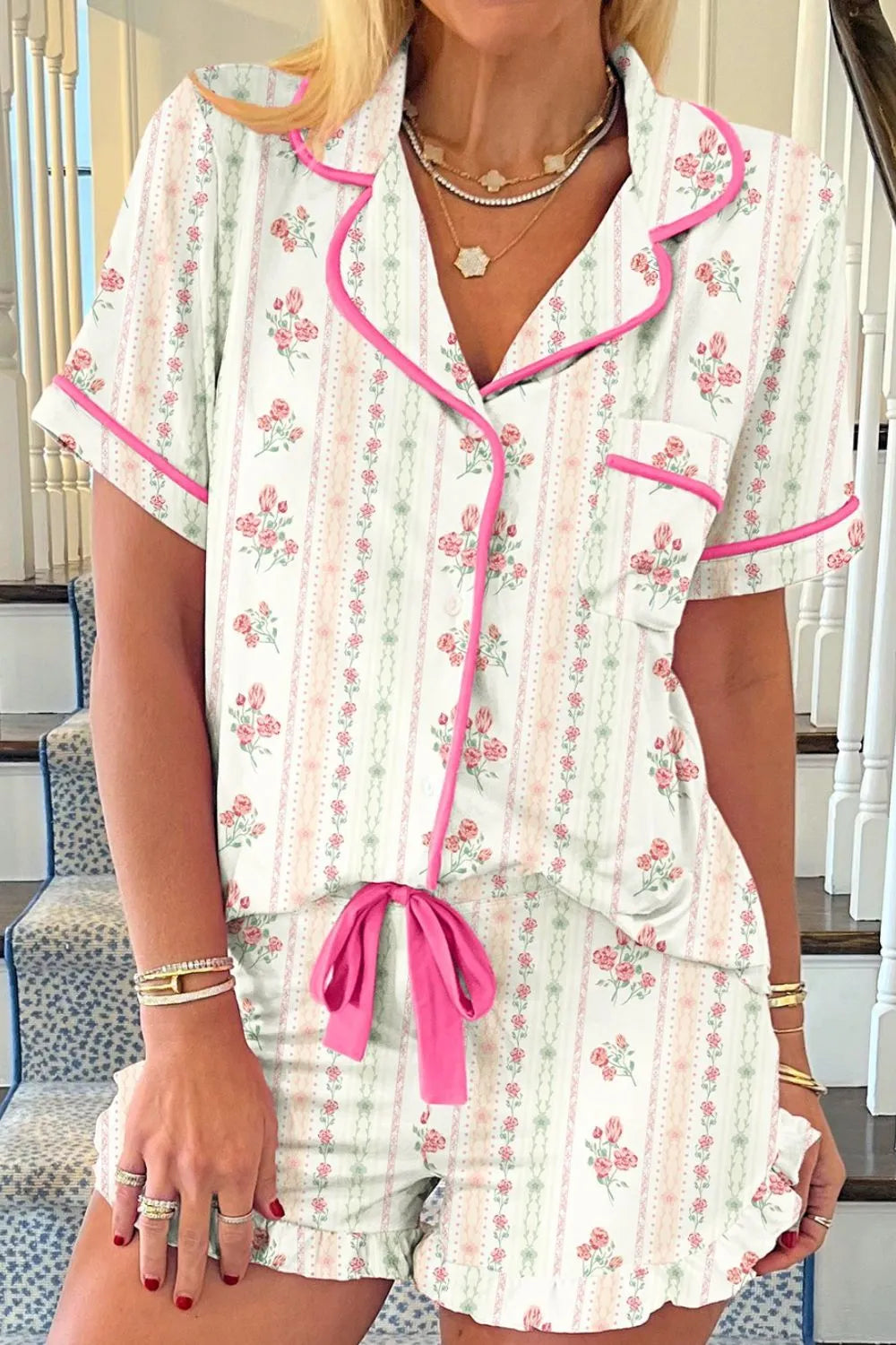 Wicked Thread Society floral print lounge set with button-up top, pink piping, drawstring waist, and frill shorts.