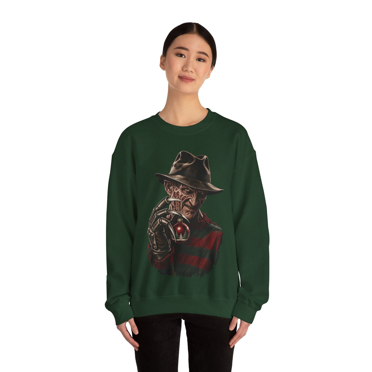 Wicked Thread Society dark green crewneck sweatshirt featuring a graphic of Freddy Krueger holding a Christmas ornament
